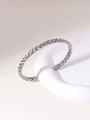Detailed close-up of handmade twisted texture on stainless steel cuff bracelet - Silver