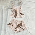 Champagne leopard print satin sleepwear set with camisole and ruffled shorts on white fur - S / Champagne Leopard