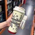 Retro lily coffee travel mug in cream white with woven lanyard and floral design - Beige