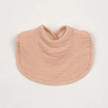 Close-up of soft multi-layer cotton muslin baby bib in peach color with ruffled texture - Peach Yellow
