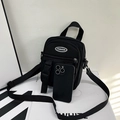 Chic black canvas crossbody bag with top handle and fashion logo for daily use - Black