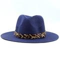 Close-up of the woven texture on a blue sun hat with leopard print band and buckle - Navy Blue