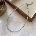 Handmade beaded necklace with turquoise seed beads and faceted crystals in golden finish - Light Colored Beaded Necklace XL0708