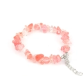 Close-up of vintage natural pink crystal crushed stone bracelet with adjustable silver clasp - Watermelon red