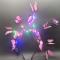 LED light-up butterfly headband with pink and purple glowing wings for parties - Light Pink Butterfly Headband With Multi-Color Lights
