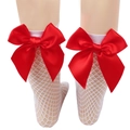 Close-up of white mesh socks featuring a large red ribbon bow on a model leg - One Size (Parent-Child) / White Fishnet / Red Bow