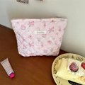 Pink quilted makeup bag with floral rabbit pattern and secure zipper closure - Pink Flower Rabbit