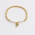 Bracelet perlé plaqué or avec perles blanches et pendentif cocotier serti de pierre verte - CB0585 Cocotier Perle