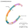 Detailed view of titanium steel bamboo bracelet with colorful enamel sections - Gold Multicolored