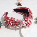 Detail of red plaid Christmas headband with white pearls and gold rhinestones on fabric - Red and White with Pearls and Rhinestones