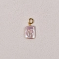 Macro view of a purple baroque pearl with golden clasp showing iridescent luster - 14-20mm Purple Square Baroque + Gold Universal Buckle