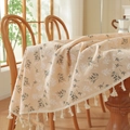 Detailed macro view of cotton linen tablecloth featuring vintage blue floral patterns and tassels - Creamy Yellow Floral Print + Sour (reverse Pressing) / Diameter 100CM