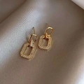 Detail of geometric rectangular earrings with sparkling zircons on champagne silk cloth - Geometric Rectangular Double Loop Pave Style (A03)