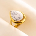 Macro view of water-drop shaped ring with white marble stone on beige fabric background - Gold Base White Stone (J535-G-W)