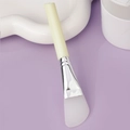 Light green silicone face mask brush with ergonomic handle and soft translucent applicator - Slanted Tail Style G / Yellow