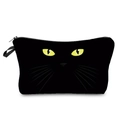 Close-up of black makeup bag featuring a yellow cat eyes print and top zipper handle - Yellow Eye Black Cat Face Print