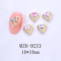 Detail von 10mm Herz Nagelschmuck in Gold mit rosa Kristall und Love-Gravur - 9233 Rosa mit Grün (Goldbasis)