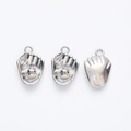 Macro shot of silver baseball glove pendants for DIY jewelry making accessories - Bright Silver