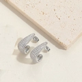 Silver-plated hoop earrings with pavé white zircon stones on travertine stone display - Silver Full Diamond Hoop