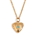 Relicario de corazón dorado con piedra azul y detalle de estrella sobre fondo blanco - Dorado - Marzo Azul Lago