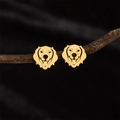 Golden stainless steel Labrador dog head stud earrings on a natural wood branch - Gold