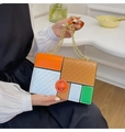 Chic color-block handbag with orange, blue and green panels and golden chain strap - Orange