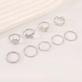 Detailed set of 10 silver rings with butterfly and flower designs on white marble base - Silver Style Set (5356) / White K/Silver