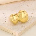 Close-up of gold geometric 18k plated ring with organic polished twin sphere design - US 6 / Gold (Organic Sphere)