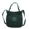 Dark green canvas bucket bag featuring top handles and an adjustable shoulder strap - Dark Green