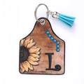 Western leather key chain with sunflower print, letter L and blue tassel accessory - Letter L