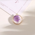 Handmade alloy resin pendant featuring real purple dried flower in a round gold frame - Style 9