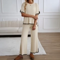 Women's two-piece beige knit set with black trim short sleeve top and wide leg pants - S / Apricot