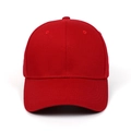 Detailed close-up of a red cotton baseball cap featuring classic six-panel construction - Burgundy