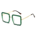 Vierkante zonnebril met groene glitter montuur en gouden metalen pootjes - Groen Frame Witte Lenzen
