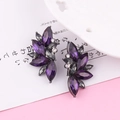 Fashion earrings with purple and grey marquise crystals set in a black alloy leaf design - Purple 1