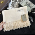 Solid cream cashmere-feel scarf with long tassels and a minimal woven label accent - 200x68cm / Off White