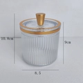 Luxus Vorratsglas transparent mit Golddeckel und vertikaler Streifenstruktur 10,8cm - Metallischer Konischer Griff / Transparent