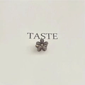 Deep grey camellia flower hair claw clip with crystal center on a minimalist card - Dark Gray