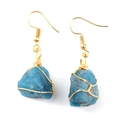 Detail of handmade gold wire-wrapped blue raw stone drop earrings with fishhook hooks - Gold + Blue Apatite