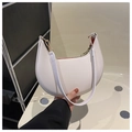 Detail view of white half-moon shoulder bag with golden zipper and red inner lining - White