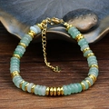 Light green beaded stone bracelet with stainless steel gold accents and clasp - Green Aventurine
