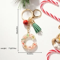 Christmas letter C resin keychain with festive sequins, red bell and green tassel - Letter C