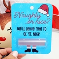 Blue Christmas money holder card with Naughty or Nice Santa text and snowflake details - Red Christmas Hat
