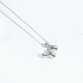 Minimalist silver bubble letter M pendant necklace with liquid metal finish design - Letter W