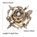 Retro bronze skull and rose brooch with rhinestones and thorn branch details - Antique Gold