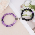 Magnetic couples bracelets with purple cracked beads and black matte stone hearts - Matte Stone And Purple Weathered Stone With White Heart Magnet (BNS-0221)
