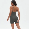 Detail of charcoal grey high-waisted yoga shorts with scrunch butt lifting design - S / Dark Gray