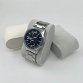 Silver stainless steel chronograph watch displayed on a premium grey velvet watch pillow - Gray Velvet Watch Pillow