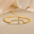 Bracciale a catena cubana placcato oro con ciondolo a croce in zirconi lucidi - Stile Croce in Pietra Rotonda