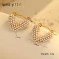 Macro shot of 18K gold heart-shaped hoop earrings with inlaid white pearls and dimensions - Heart Pearl Hoop